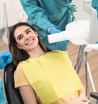 Woman grinning at her dentist