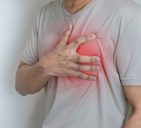 Man clutching his chest