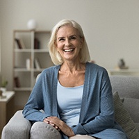 smiling older woman in her home